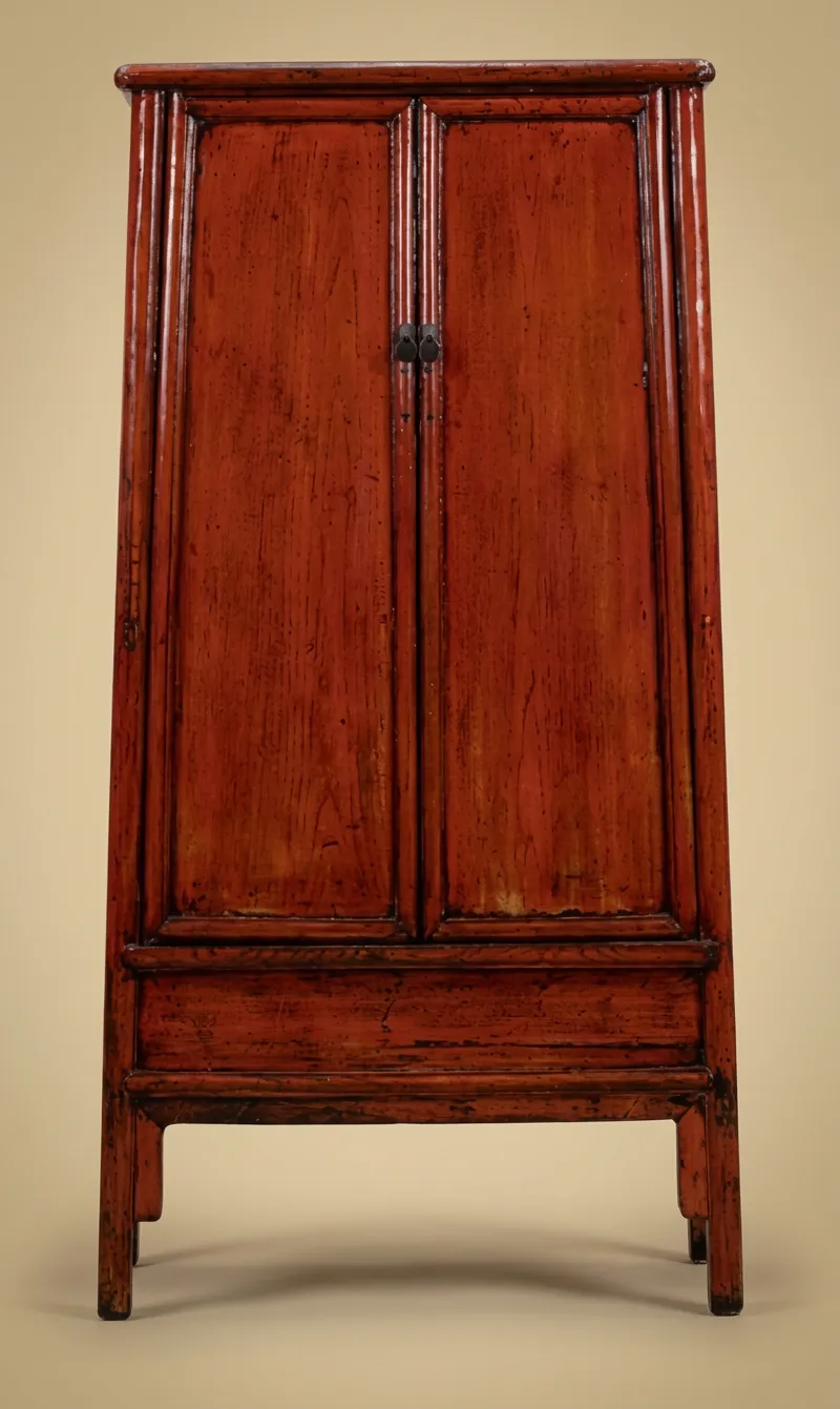 Chinese lacquered cabinet, Qing period — Orange-toned lacquered wood, bronze fitting — 19th century