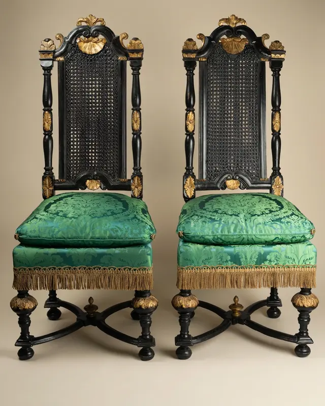 Pair of carved walnut chairs, late 17th century